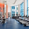 Spacious fitness center with plenty of light